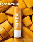 NIVEA Mango Lip Care, Vegan Lip Balm Pack with Shea Butter, Nourishing Oils and Vitamin C & E, 3-in-1 Moisturize, Repair and Protect, 0.17 Oz Stick, Pack of 4