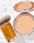 tarte Amazonian clay blurring powder foundation 32H Medium