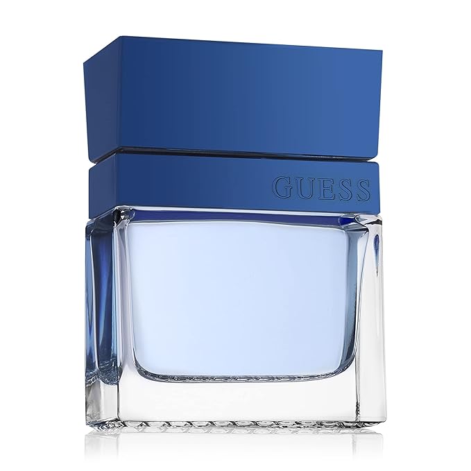 Guess Seductive Blue Men/Homme Eau de Toilette 4 Piece Gift Set - Cologne Spray 3.4 Fl. Oz., Deodorizing Body Spray 6.0 Oz., Shower Gel 3.4 Fl. Oz., & Pouch