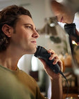 Philips Norelco Shaver 1100 Series, Dry Electric Shaver, 27 Self-Sharpening ComfortCut Blades, 4D Floating Heads, P-Cap, Deep Black, Model S1016/90