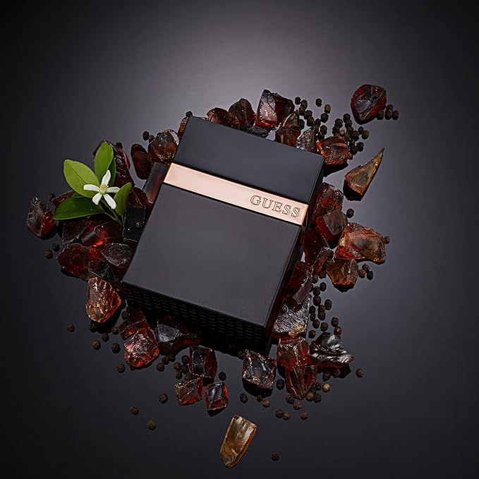 Guess Seductive Noir Men/Homme Eau de Toilette 4 Piece Gift Set - Cologne Spray 3.4 Fl. Oz., Deodorizing Body Spray 6.0 Oz., Shower Gel 3.4 Fl. Oz., & Pouch